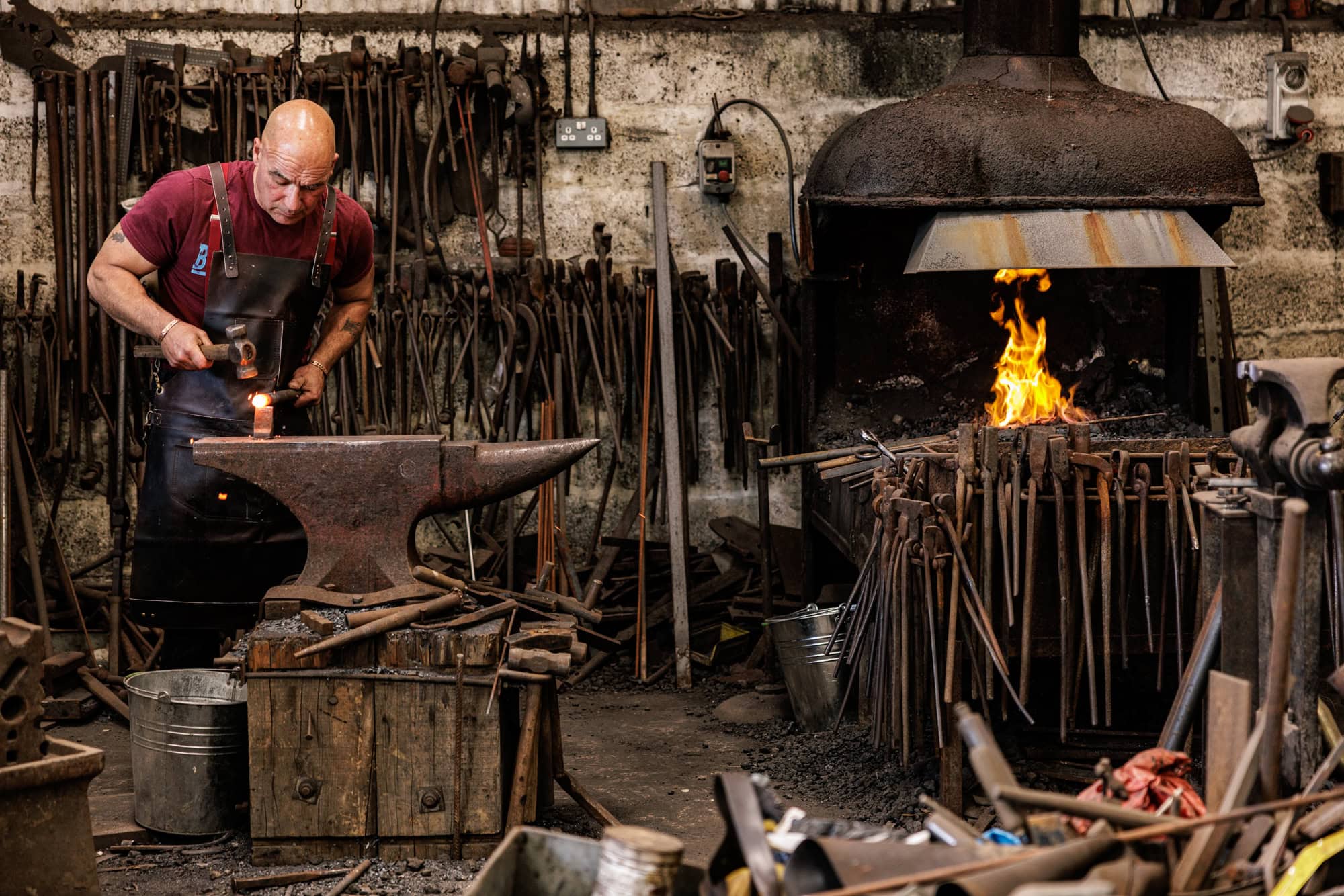 bespoke ironwork forge craftsman at work